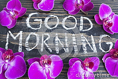 Words Good Morning with Orchids Stock Photo