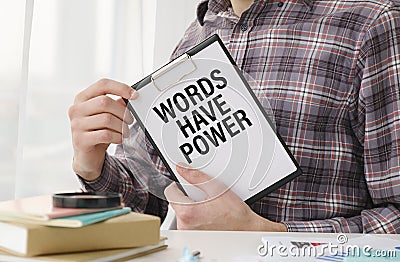 Words have Power - Businesswoman holding Stock Photo