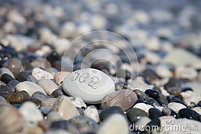Words on pebble stones â€“ motivational concept slogan â€“ word sea Stock Photo