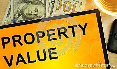 Words property value on tablet. Stock Photo