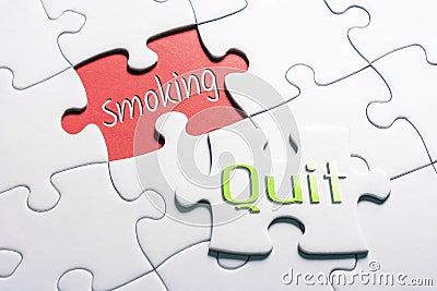The Words Quit And Smoking In Missing Piece Jigsaw Puzzle Stock Photo