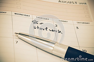 The words Start work written Stock Photo