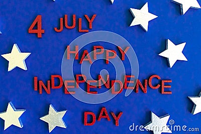 Wooden letters in red. Happy independence day Stock Photo