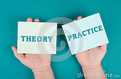 The words theory and practice are standing on pieces of paper, education concept Stock Photo