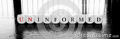 Words uninformed or informad - dilema concept Stock Photo