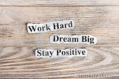 Work Hard, Dream Big, Stay Positive text on paper. Word Work Hard, Dream Big, Stay Positive on torn paper. Concept Image Stock Photo
