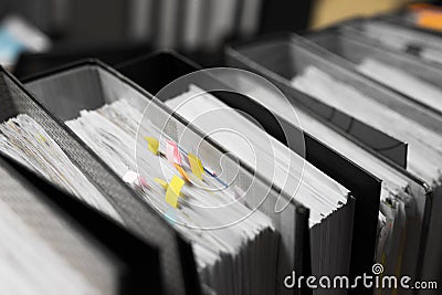 Work hard, Lot of work, Stacks of document paper and files folder on office desk, Post it on paperwork. Stock Photo