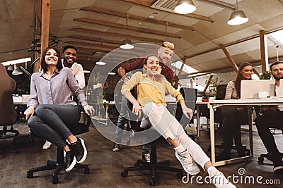 Work hard play hard. Business people having fun in office Stock Photo