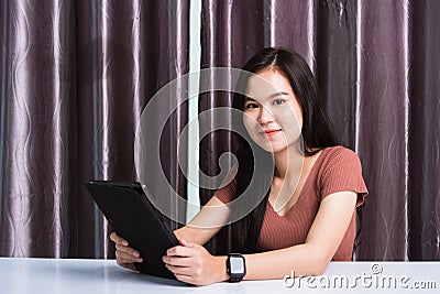 Business beautiful woman video call conferencing, write, check or read mail on digital tablet computer Stock Photo