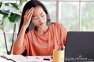 Work from home, Young asian woman struggle with laptop computer, Frustrated asia girl looking at laptop while studying online Stock Photo