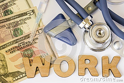 Work in hospitals, clinics, occupational medicine and pharmacy concept photo. Stethoscope, neurological hammer, dollar bills and s Stock Photo
