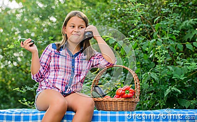 At work. kid on summer farm. Organic food. little girl vegetable in basket. Only natural. healthy food for children Stock Photo