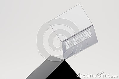 work at the laptop. laptop balancing on a gray cube on a white background. 3D render Stock Photo