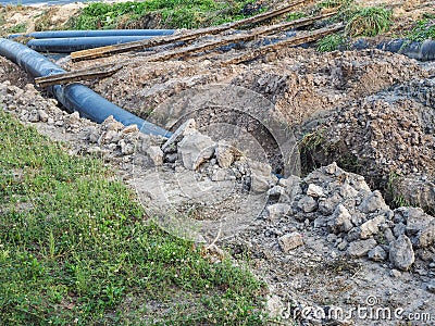 Work laying tubes. Stock Photo