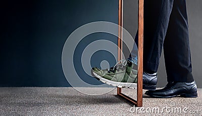 Work Life Balance Concept. Challenging to Change. Low Section of Businessman Steps passing a wooden frame Stock Photo