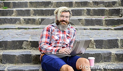 Work and relax. Working online. Hipster inspired work in urban space. Modern laptop. Remote job. When deadline coming Stock Photo