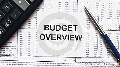 Work smarter text Budget Overview on white sheet with pen, calculator and tables Stock Photo