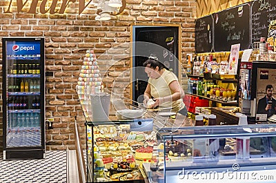 Work in a sweetshop Editorial Stock Photo
