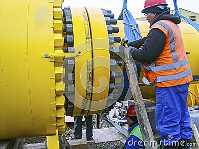 Work tighten the nuts on the flange Editorial Stock Photo