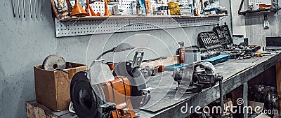 Workbench with vise, grinder, sets of keys tools Stock Photo