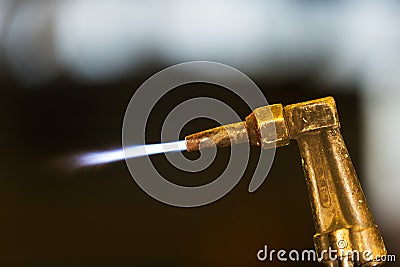 Worker adjust acetylene torch Stock Photo