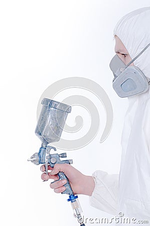 Worker with airbrush gun Stock Photo