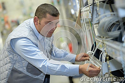 Worker on automotive spare parts warehouse Stock Photo