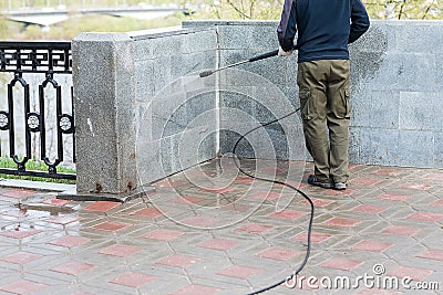 Worker cleaning street Stock Photo