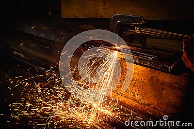 Worker cutting steel with acetylene welding cutting Stock Photo