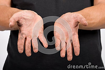 Worker with dirty hands Stock Photo