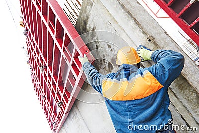 Worker disassemble falsework construction Stock Photo