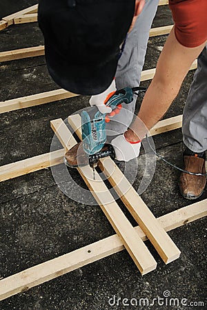 Worker drill holes. Stock Photo
