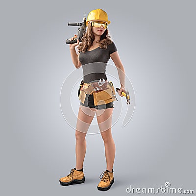 Worker girl in a helmet with drill and hammer Stock Photo