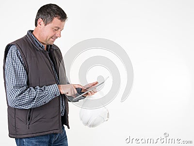 worker handsome Foreman man work with tablet computer Stock Photo