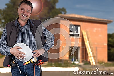 Worker handsome man with helmet security front house of brick in construction site Stock Photo