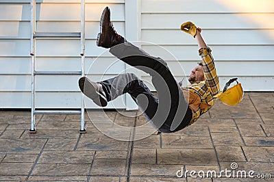 Worker Falling from Ladder Stock Photo