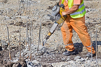 Worker with jackhammer Stock Photo