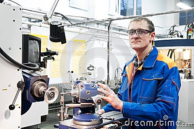 Worker at machine tool operating Stock Photo