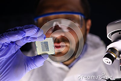 Worker making diagnostics of chip Stock Photo