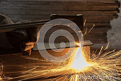 Worker metal Cutting With acetylene welding cutting torch Stock Photo