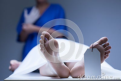 Worker of morgue during job Stock Photo