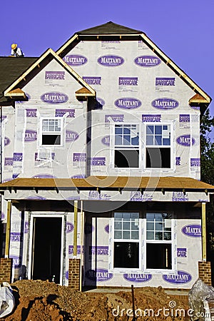 Worker at New Home Construction Site Editorial Stock Photo