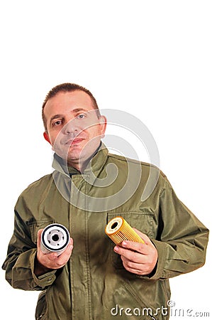 Worker with the oil filter Stock Photo