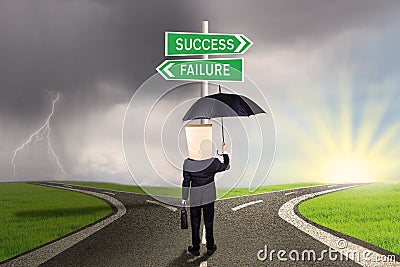 Worker with options to success or failure Stock Photo