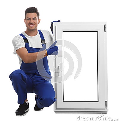 Worker with plastic window on white. Installation service Stock Photo