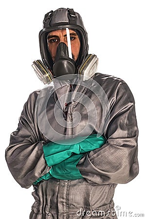 Production worker in protective overalls, mask and gloves Stock Photo