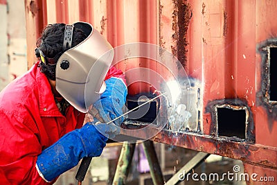 Worker repair container box by gas cutting and welding, Job, wor Stock Photo