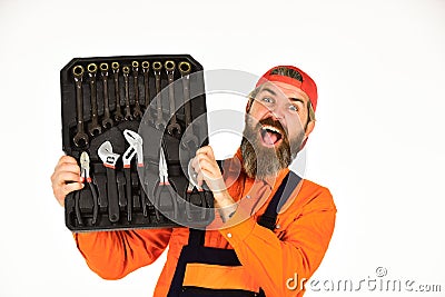 Worker repairer repairman handyman carrying toolbox. Really good tools. Mechanic Tool Box. Man in uniform carries Stock Photo