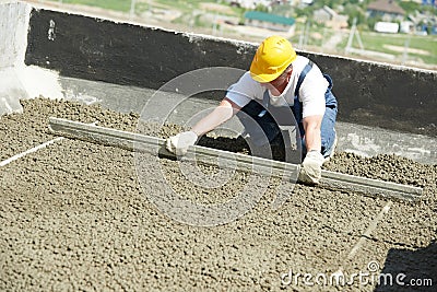 Worker roofer with float lute Stock Photo