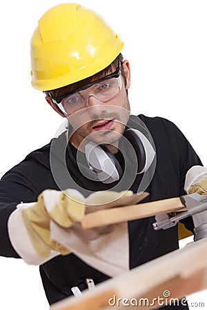 Worker with sandpaper Stock Photo